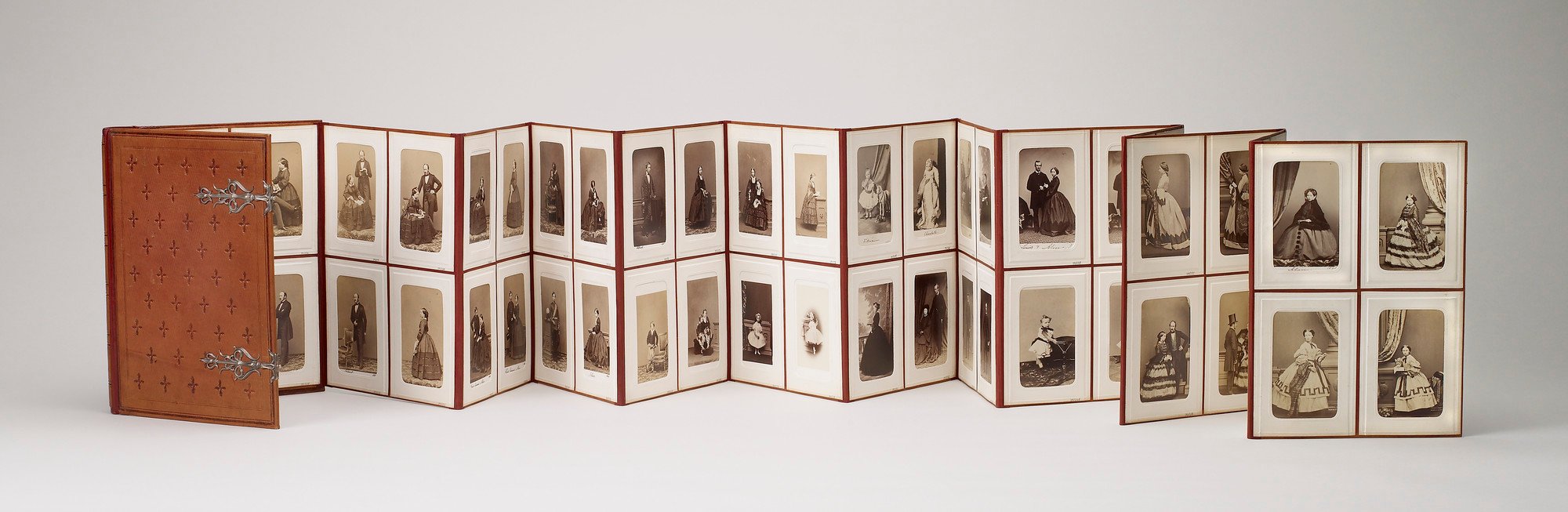 Folding concertina album containing portraits of Queen Victoria, Prince Albert, Members of the Royal Family, Foreign Royals and celebrities French calf leather album by Maquet, with silver gilt clasps and green watered silk board lining, each leaf having four embossed paper windows, containing 100 albumen cartes-de-visite (RCINs 2915115-2915213).
From the 1840s Queen Victoria began to acquire
