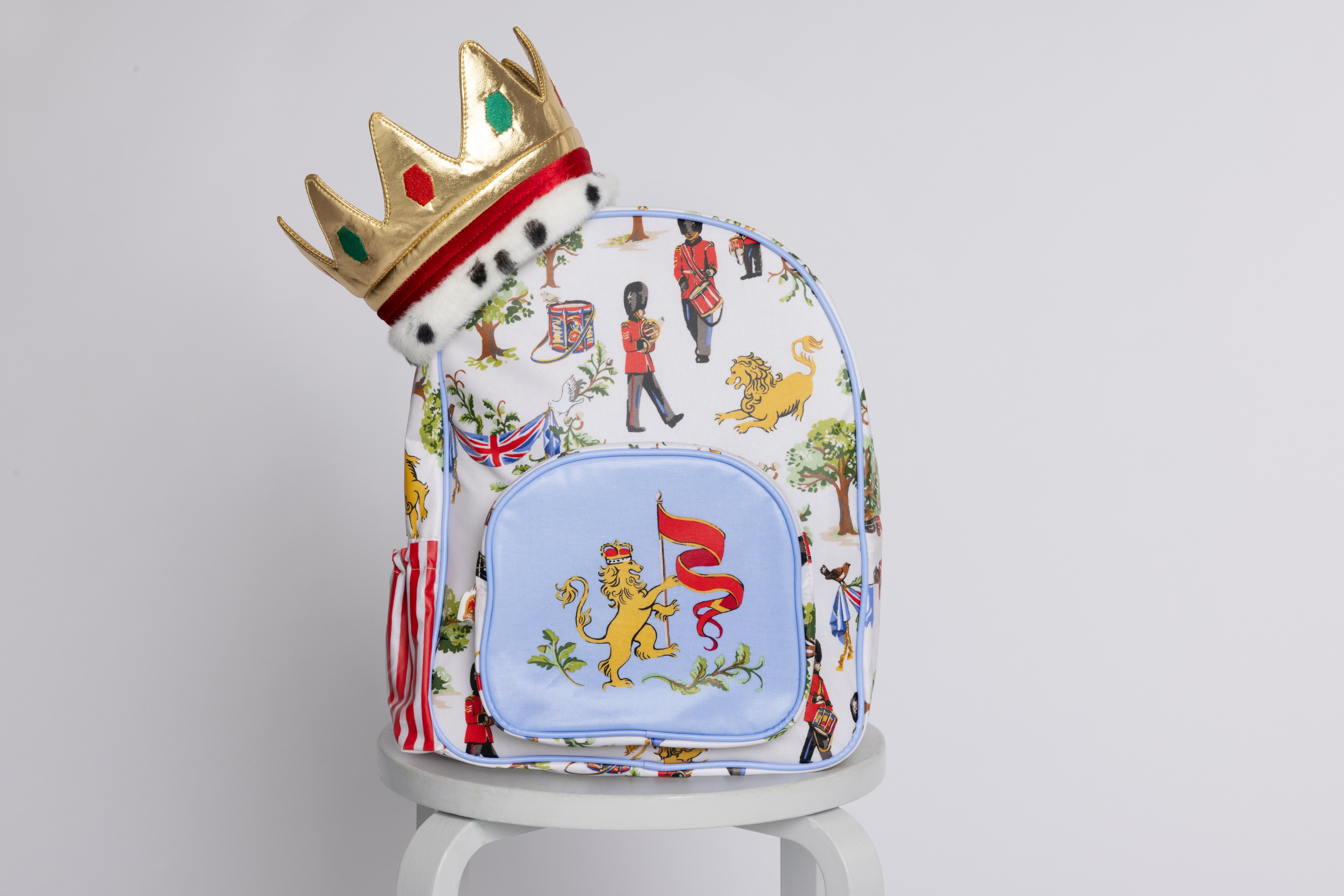 New products in the children's range, showing a crown and a new backpack